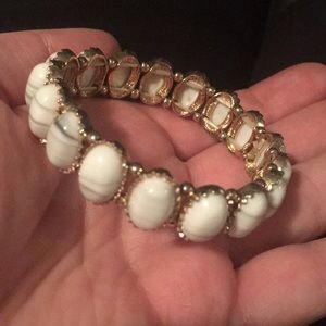 Gold stretchy bracelet with white stones
